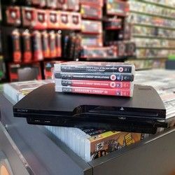 Crni Sony PlayStation 3 i poklon video igre