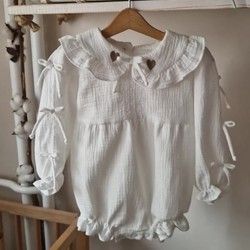 bebi-bodic-ljubav-beli-sa-krem-detaljima-3bc4dd.jpg