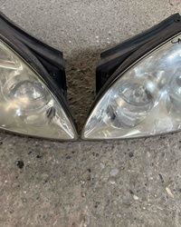 Kia Carens far levi i far desni 2006-2011