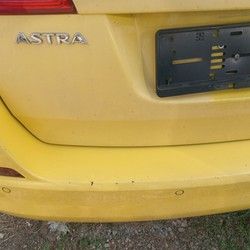 zadnji-branik-sa-katadiopterima-opel-astra-j-karavan-5f109b.jpg