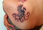 Tetoviranje FENIKSA NA RAMENU